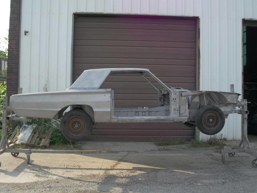 Car Body Mounted on Rotisserie AFTER Blast